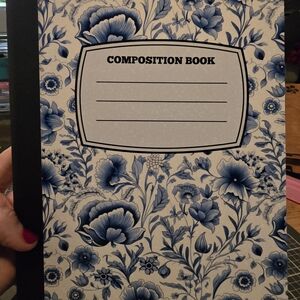 Floral Composition Book with Blue and Black Design